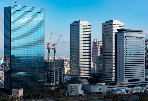 Osaka, Japan - January 11, 2017: Japan city skyline, modern districts of Osaka city  in Japan