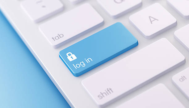 Modern Keyboard wih Blue Log in Button High quality 3d render of a modern keyboard with blue log in button on a blue background and copy space. The blue slog in keyboard button has a text and an icon on it. The log in keyboard button is in focus, Horizontal composition with copy space. log on stock pictures, royalty-free photos & images