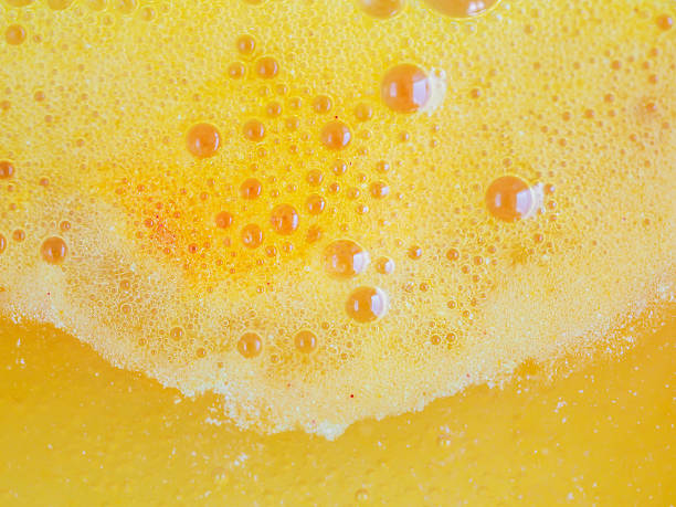 istock Abstract orange foam of effervescent water 638150438