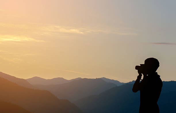 istock Silhouette of Man at View Point with Camera 638151202