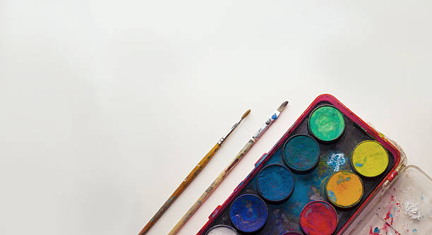istock Water color pallet with two paint brushes on white background 638151240