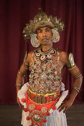Kandyan dancer during the show. Kandyan Dance is a dance form that originated in the area called Kandy of the Central hills region in Sri Lanka. But today it has been  widespread to other parts of the country.http://bhphoto.pl/IS/sri_lanka_380.jpg