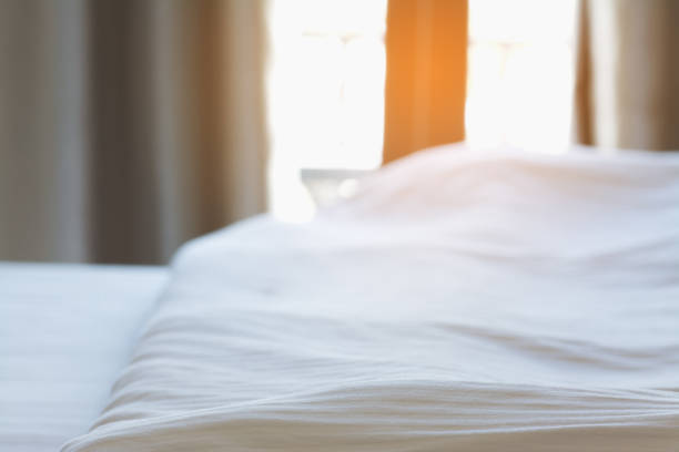 istock Bedding Sheet on Bed in Bedroom with Sunlight at Morning 638151714