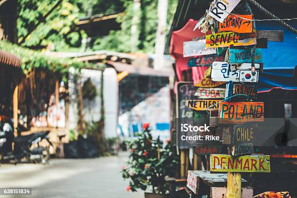 Funny Colorful Signpost To Different Countries Around The World Stock Photo - Download Image Now