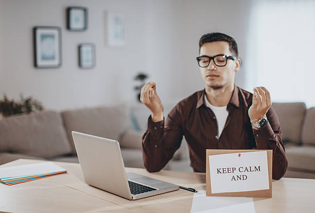 Keep Calm And... Young man with message the human body writing black human hand stock pictures, royalty-free photos & images