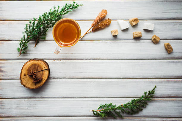 istock Cup of tea and cane sugar. On wooden background. 638152932
