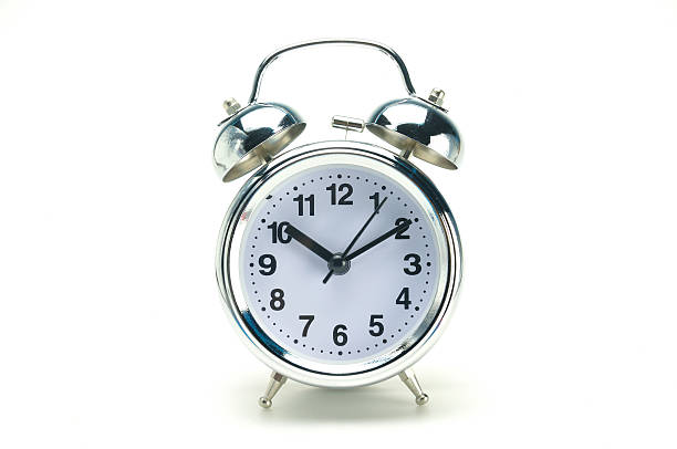istock silver alarm clock 10:10 on white background, 638154558