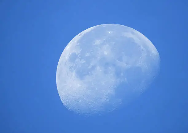Photo of Phase of the moon in daytime.