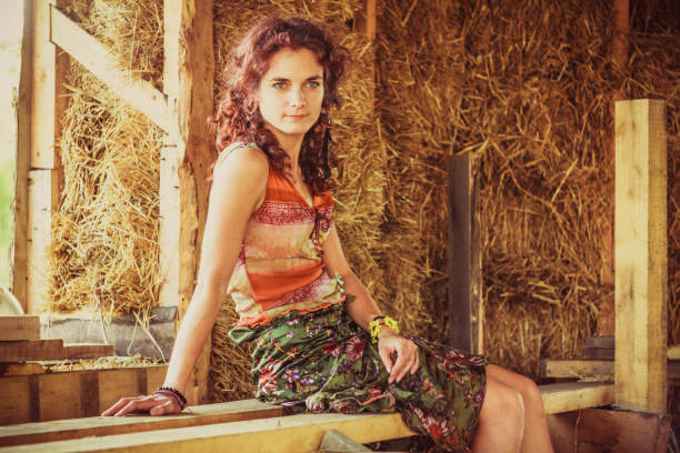 istock girl lying in the straw 638156962