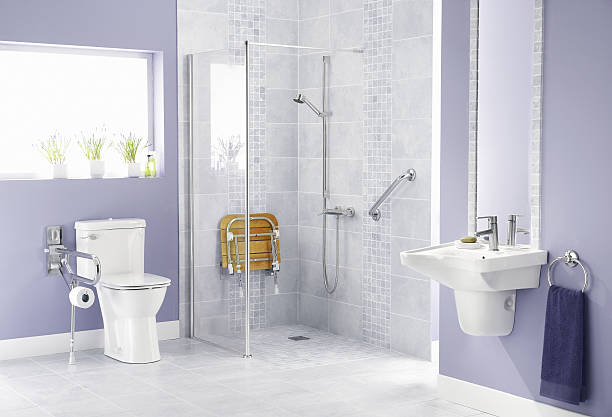 Bathroom for disabled Bathroom for people with disabilities in modern setting handle photos stock pictures, royalty-free photos & images