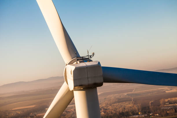 aerial view of wind turbine on a field aerial view of wind turbine on a field in Poland floating electric generator stock pictures, royalty-free photos & images