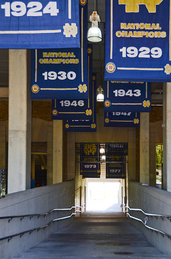 Notre Dame, United States - September 26, 2016: The ramp to enter the football stadium at the University of Notre Dame is filled with national championship banners.