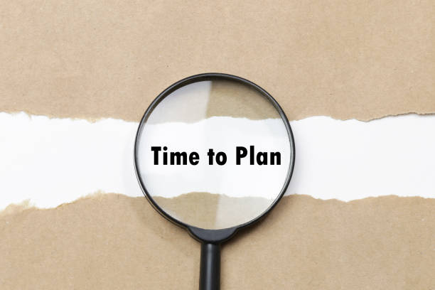 istock The words time to plan appearing behind torn paper 638167292