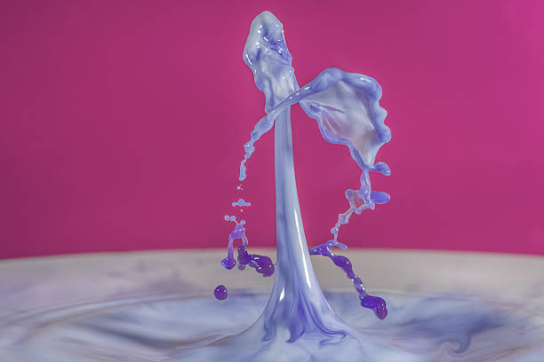 istock Milk droplets colliding together to make droplet art. 638168242