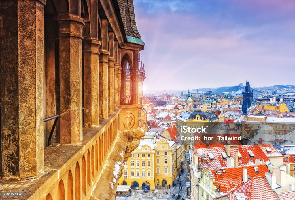 Panoramic view on Prague from the Prague Castle. Winter scene. Panoramic view on Prague from the Prague Castle on a sunny and snowy winter day, Prague, Czech Republic. Sunset , dramatic sky scene. Architecture Stock Photo