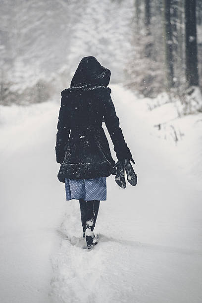 istock Women in a snowy forest 638173242