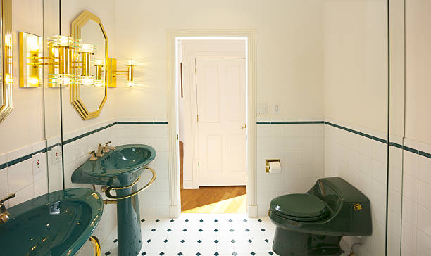 istock Small bathroom with mirror covering entire back wall 638174004