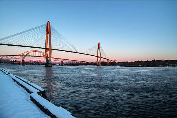 istock winter view of river and riverside at sunset 638174582