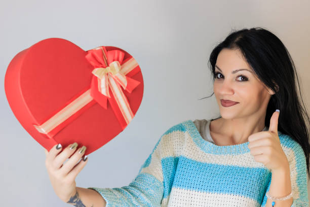 istock Attractive girl with heart, on white background 638179250