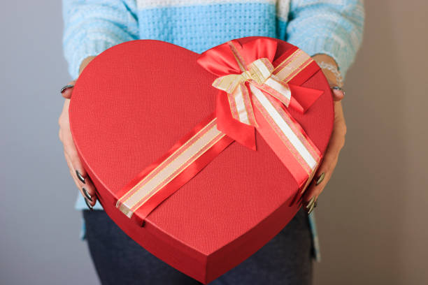 istock Attractive girl with heart, on white background 638181428