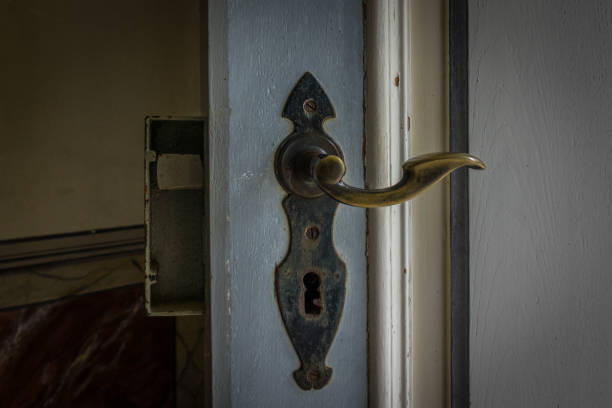 istock The old vintage door handle and keyhole 638184680