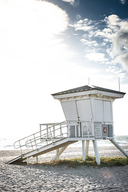 istock miami beach Lifeguard hut on sand beach 638185460