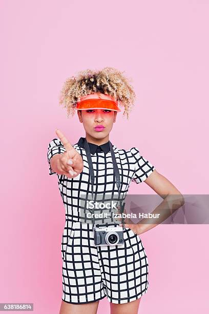 Grumpy Young Tourist Woman Showing Stop Hand Gesture Stock Photo - Download Image Now