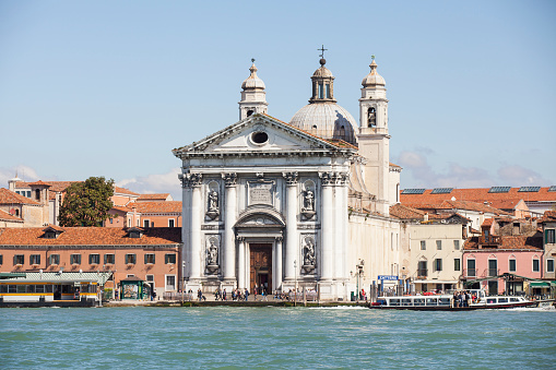 Venice, Italy - April 10, 2016: View on the lagoon of Venice with church Santa Maria del Rosario o dei Gesuati commonly know as Il Gesuati