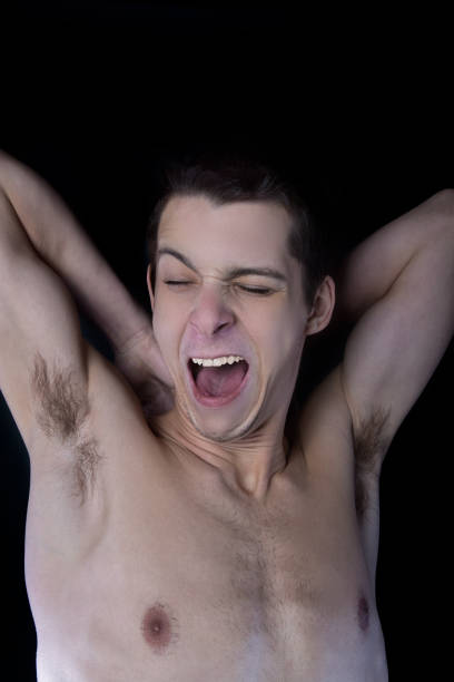 istock young man yawn sleepy 638191812