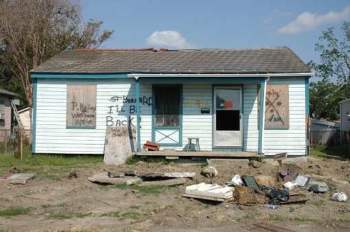 New Orleans, Louisiana, USA-May 24, 2006. An abandoned house sits among a pile of rubble in New Orleans' Ninth Ward neighborhood. The Ninth Ward was one of the heaviest flooded areas after Hurricane Katrina passed through Louisiana.