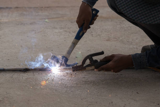 istock Welder working welding metal 638197538