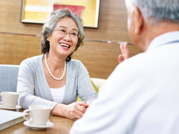 istock loving senior asian couple chatting 638198024