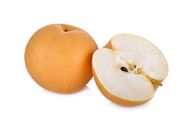 istock whole and cut snow pear or Fengsui pear on white 638198350