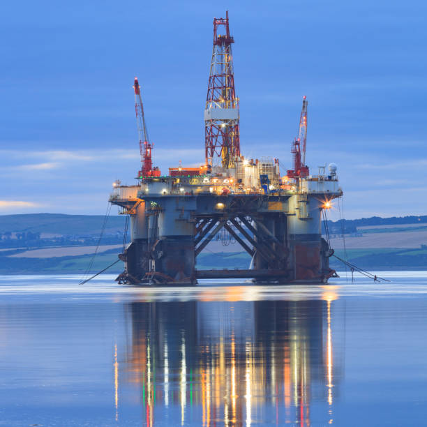 istock Semi Submersible Oil Rig during Sunrise at Cromarty Firth 638200416