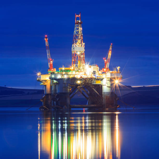 istock Semi Submersible Oil Rig during Sunrise at Cromarty Firth 638200420