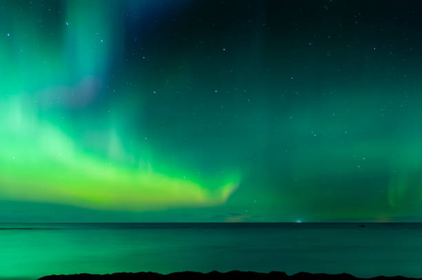 istock Northern lights over the sea 638200822