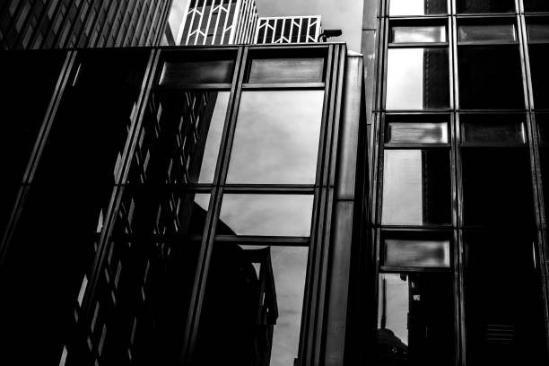 Office buildings stretch up to the sky with B&W color