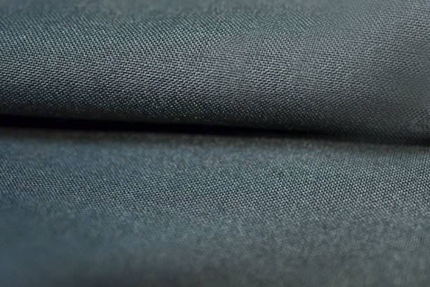 istock close up roll texture fabric of suit 638202982