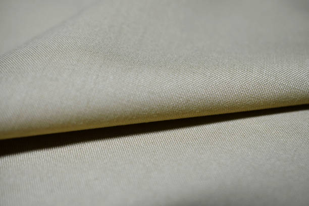 istock close up texture light brown fabric of suit 638203132
