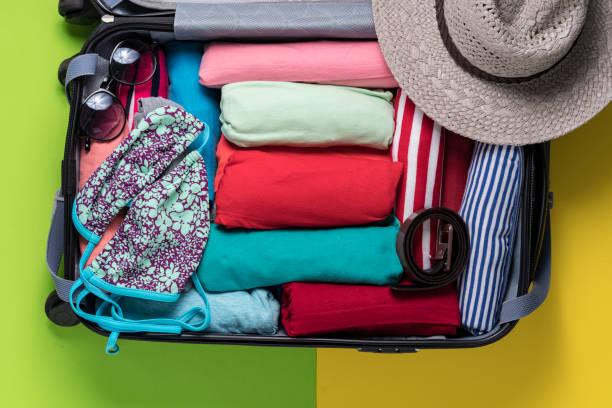 istock packing a luggage for a new journey 638203726