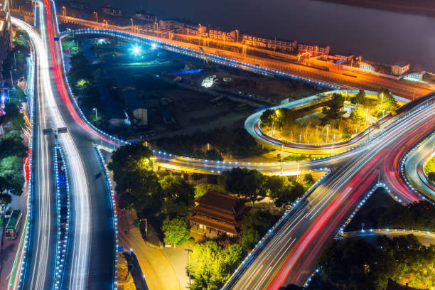 istock urban traffic with cityscape 638205940