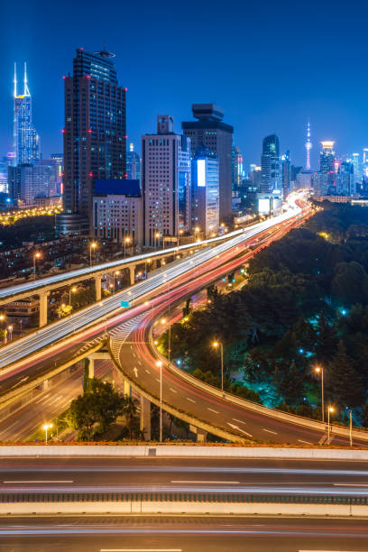 istock urban traffic with cityscape 638206656