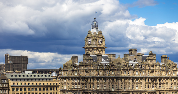 The Balmoral clock and the Saltire flying high over Edinburgh. Still taken from time lapse video #594757792.