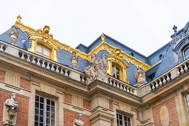 Paris, France - January 7, 2016: The Palace of Versailles, on a winter afternoon. Versailles was a hunting lodge until King Louis XVI transformed it into a grand palace and monument during the 17th century.