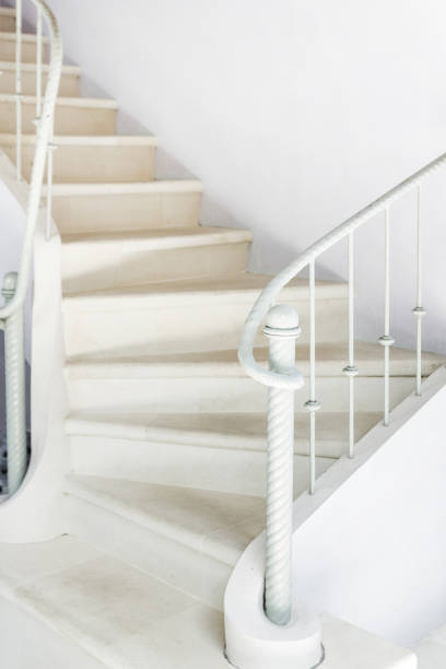 istock White stairs with vintage white railing 638208592