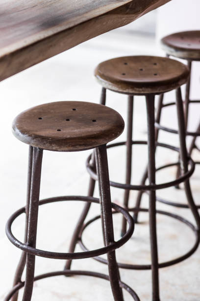 istock Bar with wooden vintage round tall chairs 638208610