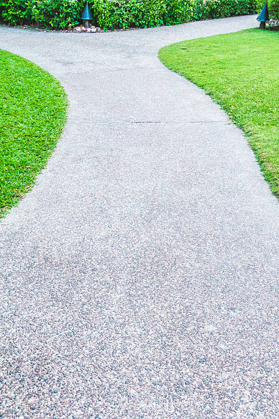 istock Stone path way around beautiful garden 638211828
