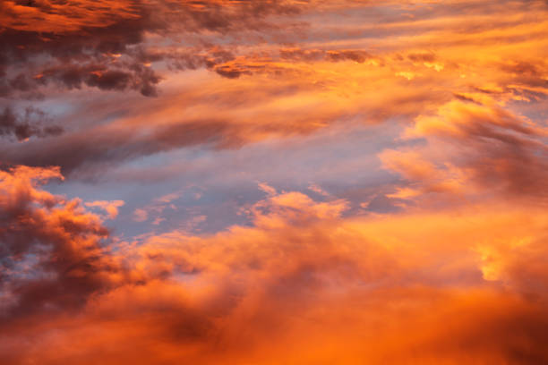 istock Colorful Heavenly Orange Warm Clouds On Sky at Sunset 638214644
