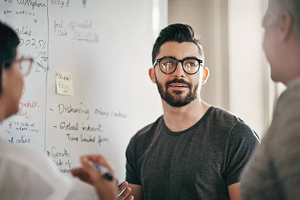 istock Bringing the team up to speed with his plans 638218986