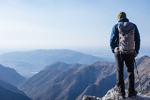 istock Climber watches a mountain valley 638226828